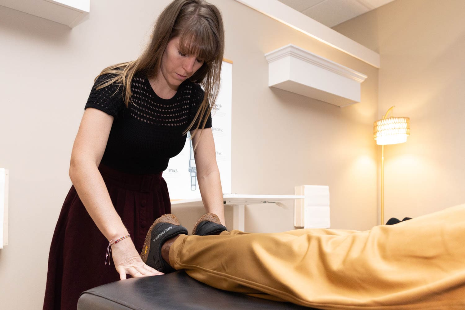 Dr. Tara performing an adjustment on a patient